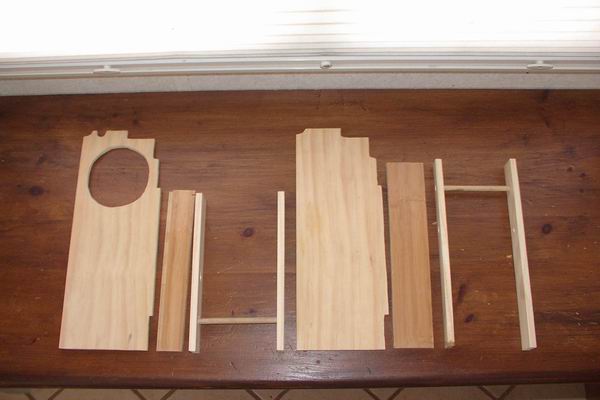 Wood pieces cut out for small space storage in bathroom